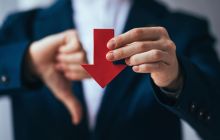 Crypto majors slide as tariff fears spark risk-off move; gold zooms to record highs